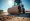 What is a Skid Steer Roller Attachment for Rent in Construction?